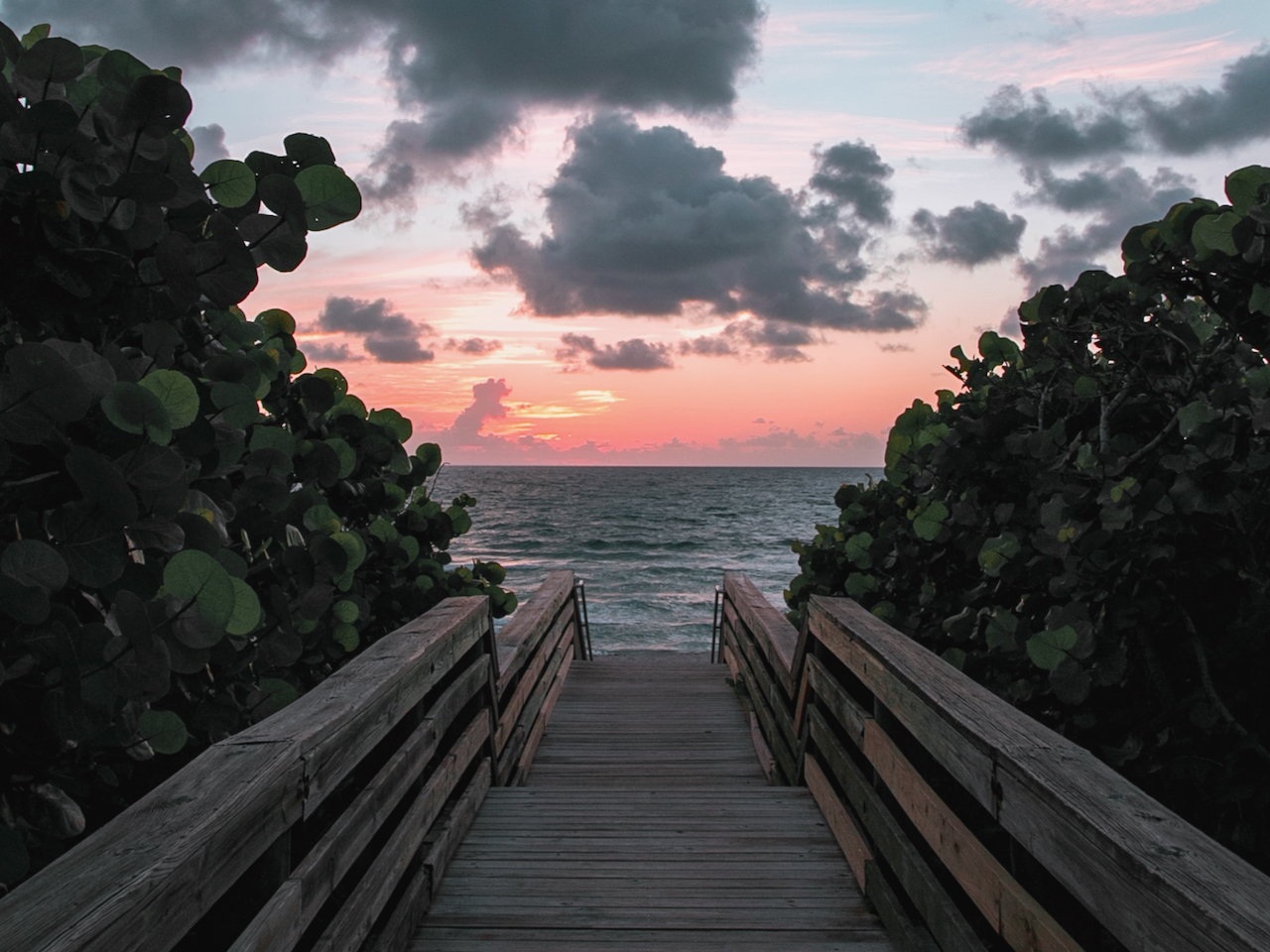 image of boardwalk leadig to the sea